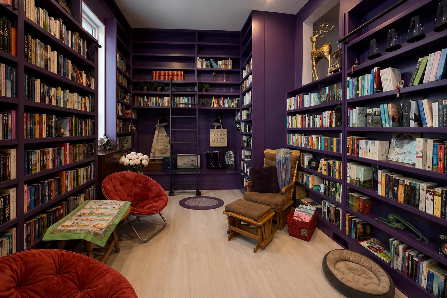 Purple floor-to-ceiling home library with rolling ladder
